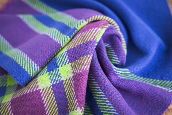 Hand-woven plaid napkins in vibrant colors